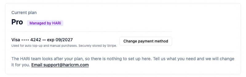 The Current plan card on Settings → Billing showing Visa •••• 4242 and a Change payment method button