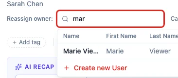The Reassign owner picker searching a teammate by name, showing a matching person